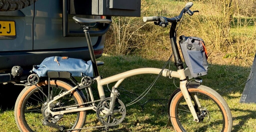 a bicycle parked in the grass