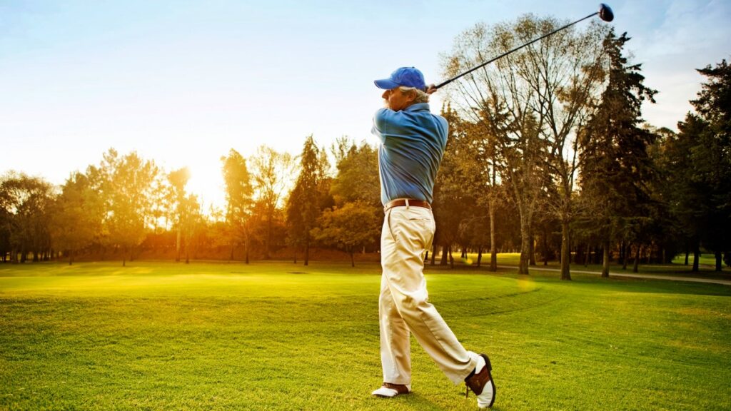 Man swinging golf club.jpg