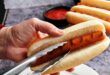 Man preparing hot dog.jpg